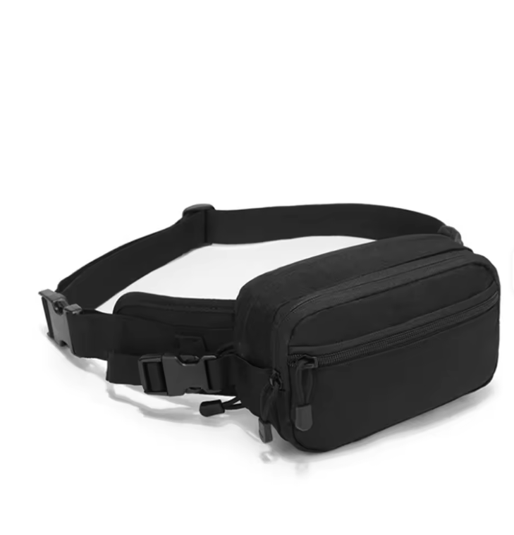 OnyxRig Utility Waist Bag in Black, worn angle showing quick-access zip pocket